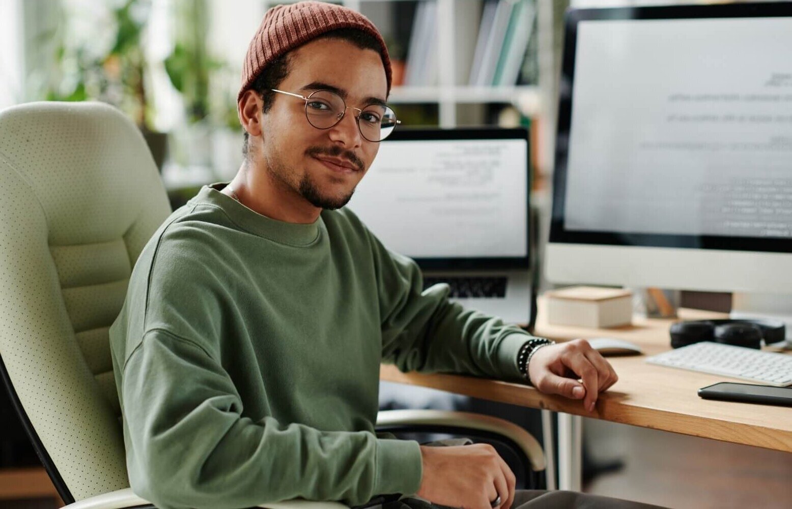 Young programmer studying HTML and CSS coding as part of Programming Fundamentals Diploma