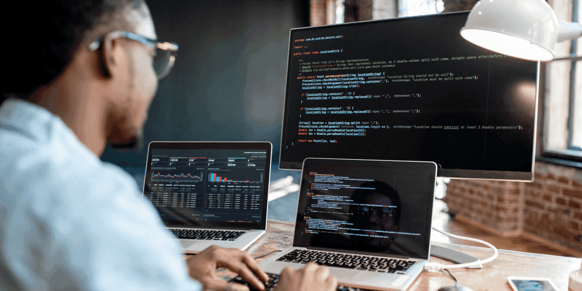 A programmer crafting innovative solutions, demonstrating the creative potential and job security of pursuing a career in technology.