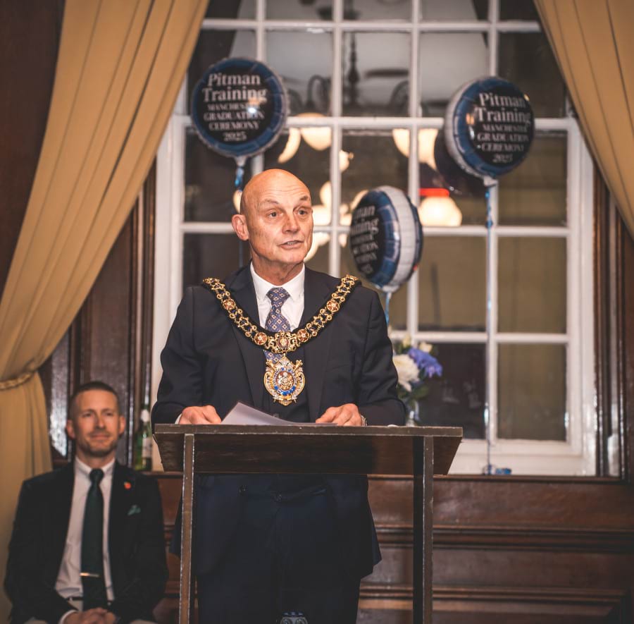 The Lord Mayor of Manchester speaking at the Pitman Training Manchester Graduation Ceremony 2025