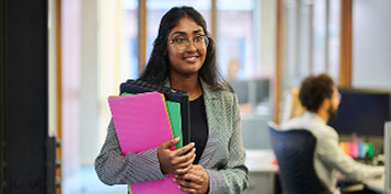 Team discussing case information during paralegal apprenticeship training