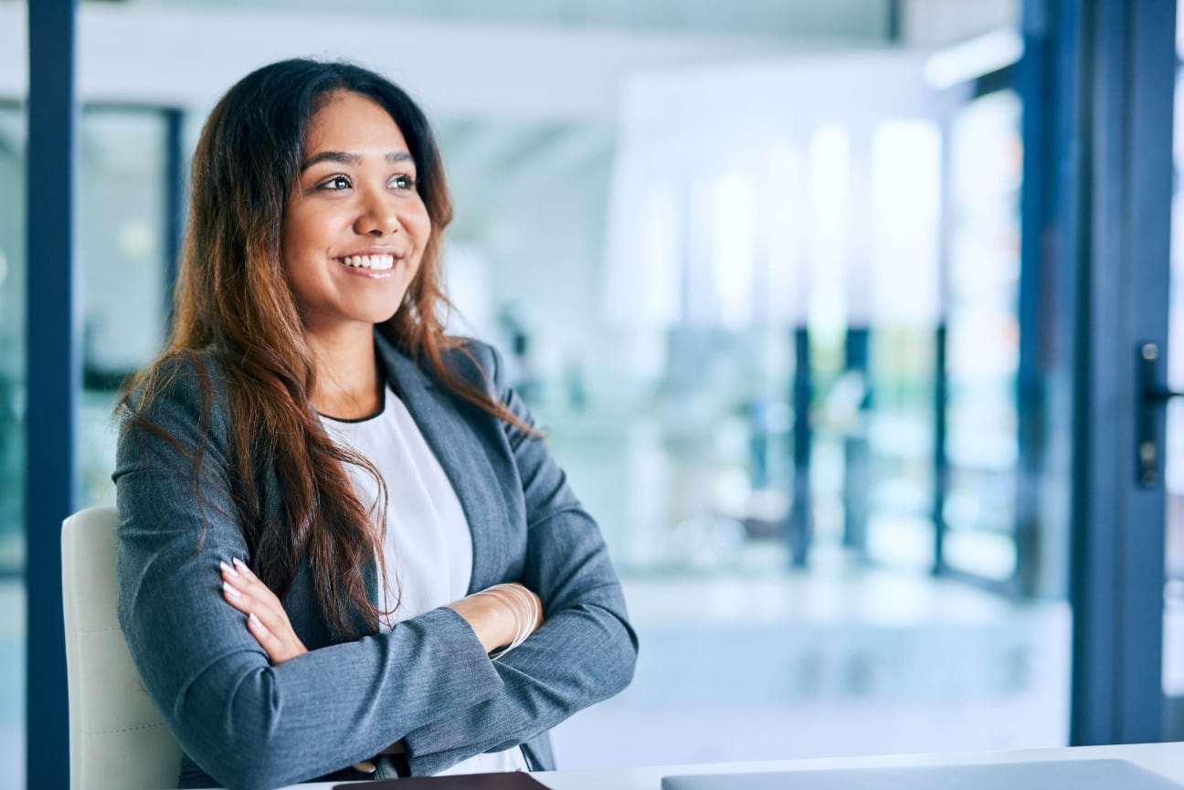 Professionals discussing apprenticeship training in a modern workplace